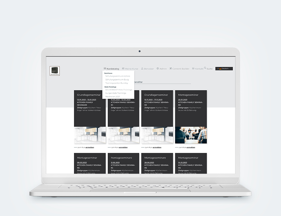 Ein Laptop zeigt einen Screenshot aus dem LMS der baumann Group