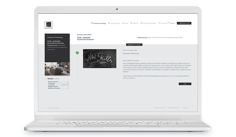 Ein Laptop mit einem Screenshot des LMS der baumann Group