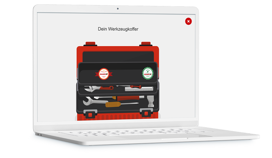 Laptop mit Screenshot aus dem Training zeigt, abgebildet ist ein Werkzeugkoffer.